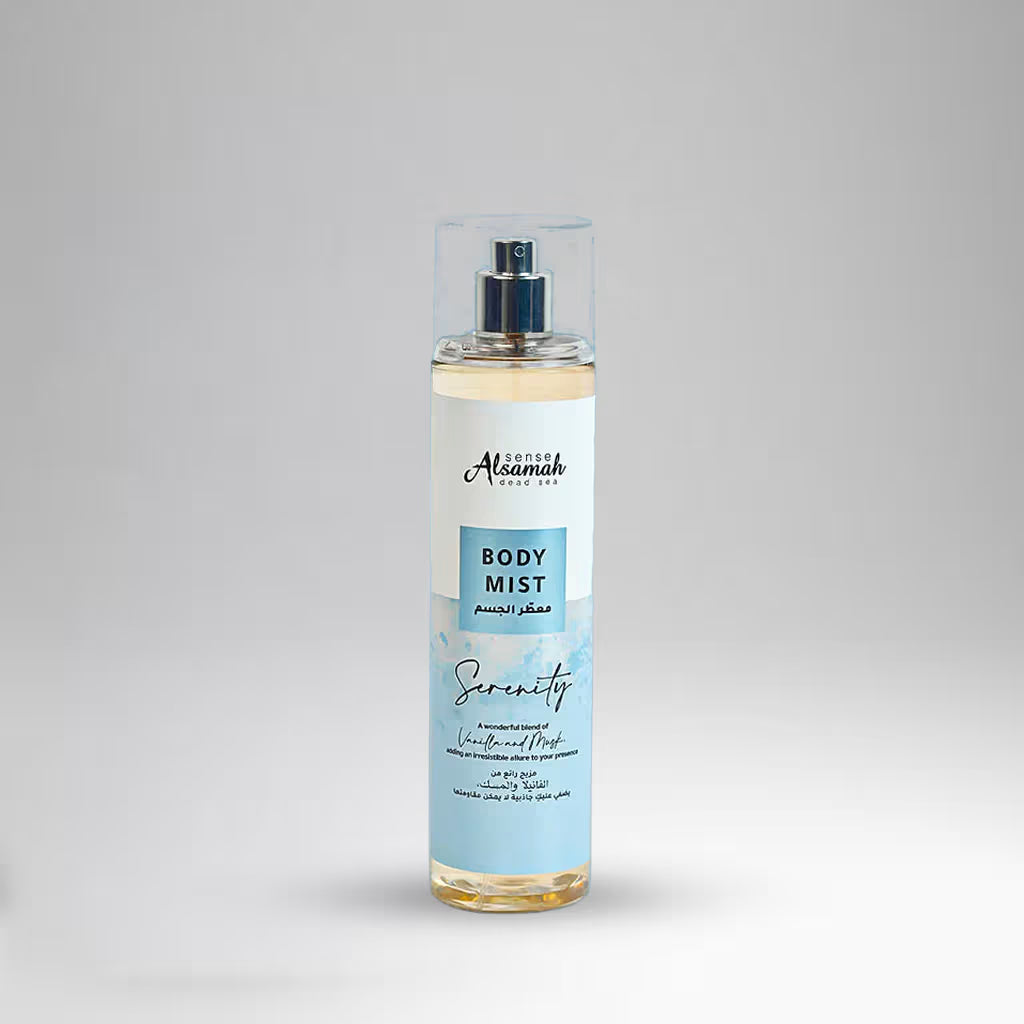 Body mist bottle with a label on a gray background