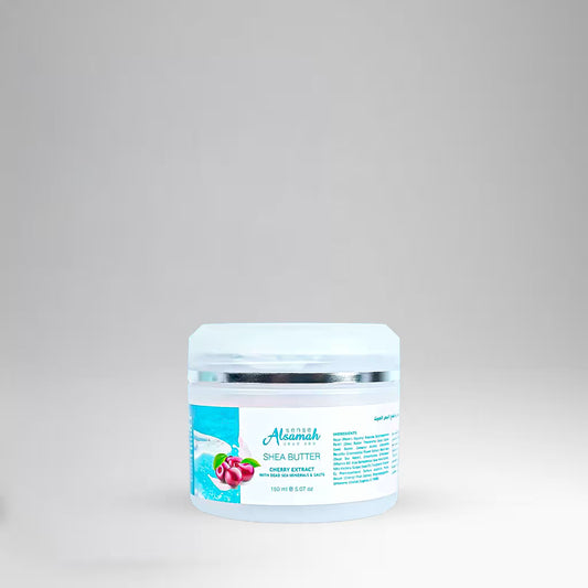 Jar of shea butter with a white lid on a gray background
