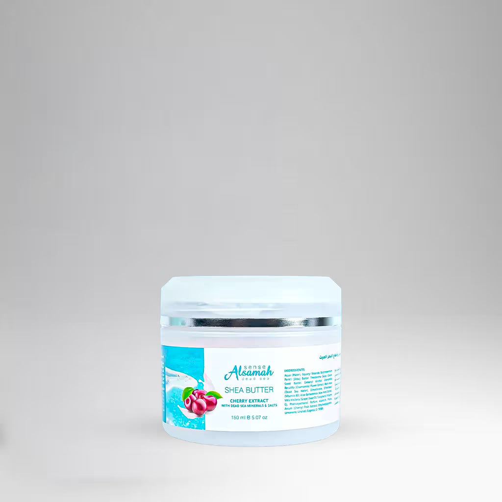 Jar of shea butter with a white lid on a gray background