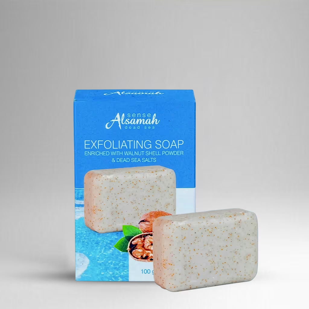 Exfoliating soap with packaging on a gray background