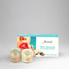 Lip scrub and balm set with packaging featuring a woman's lips and flowers on a gray background.