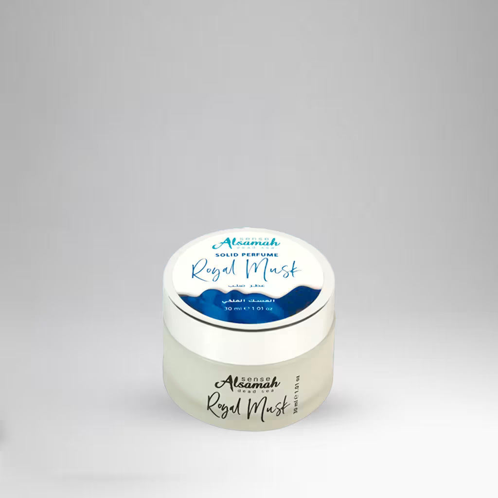 Jar of Al-Samah Solid Perfume Royal Musk on a light gray background